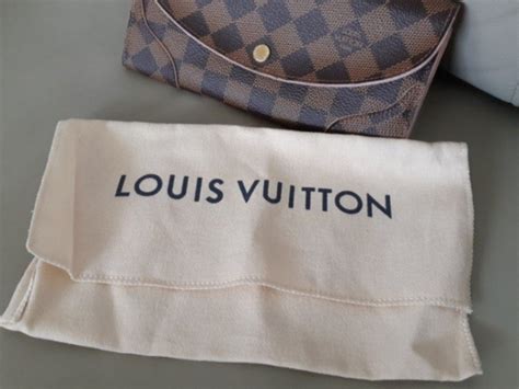 louis vuitton small dust bag|Louis Vuitton clear bag.